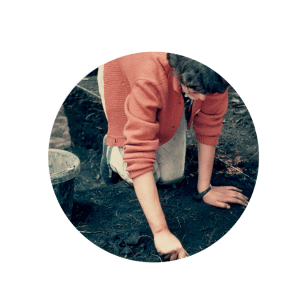 Archaeologist in woods in 1960s