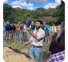 Potter Shem Morgan is delighted as he lifts a fully reduced, black pitcher from the kiln